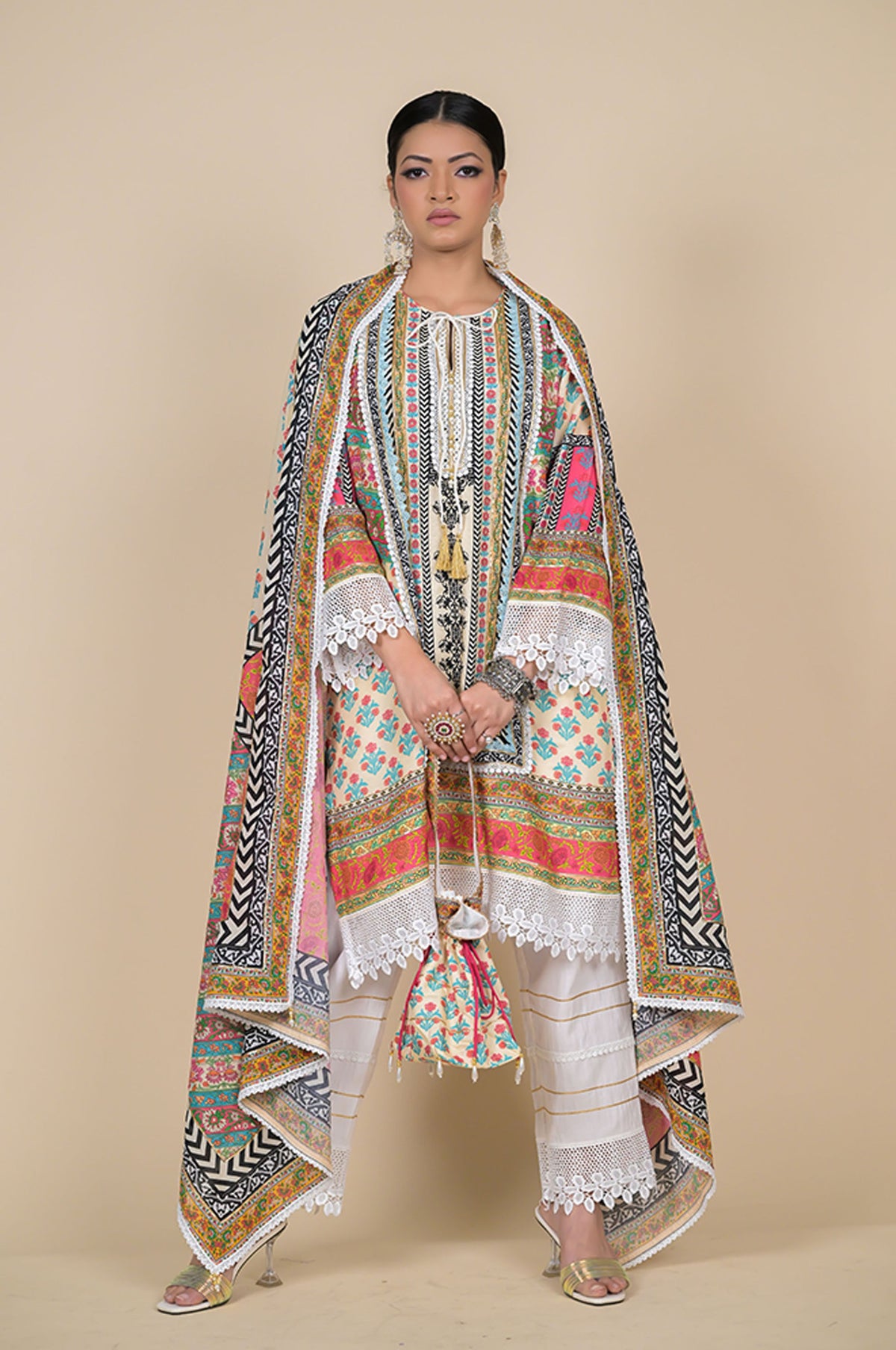Orange Cotton Muslin Suit with Multicolor Dupatta & Potli Bag