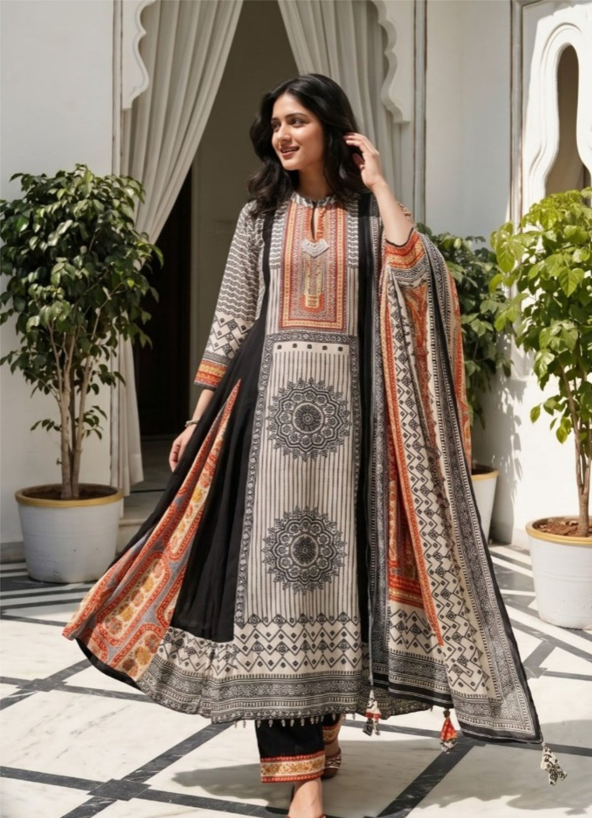 Black Cream Printed Georgette Muslin Kalidar Kurta Suit Set